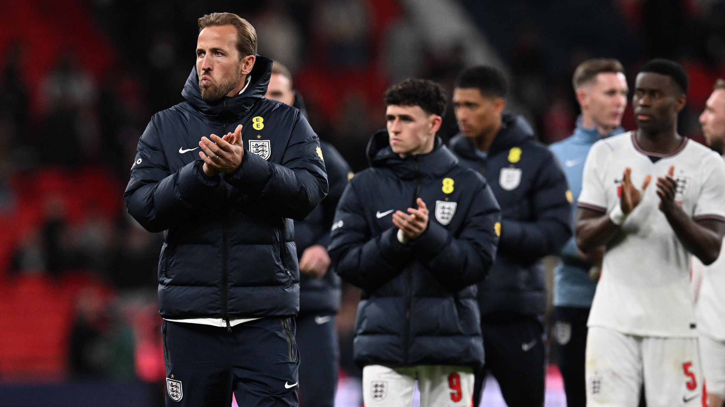 Harry Kane and teammates applaud fans